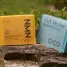 A couple of books sitting on top of a log
