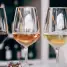 a group of wine glasses sitting on top of a table