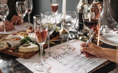 Elegant wine tasting event with cheese platter and detailed tasting notes for a refined experience.