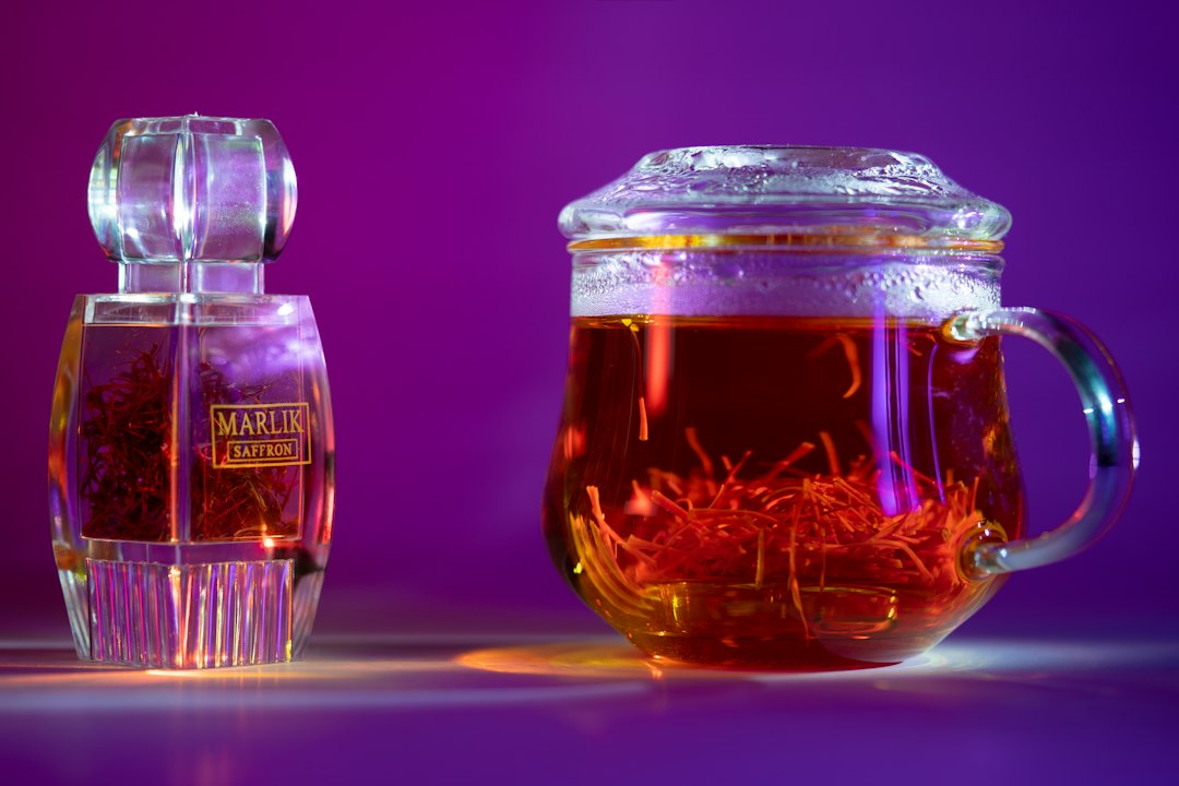 clear glass jar with red liquid