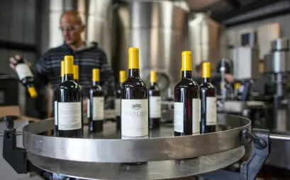 wine bottles on stainless steel round table